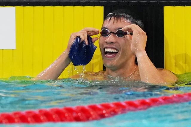 (251116) -- SHENZHEN, Nov. 16, 2025 (Xinhua) -- Ho Ian Yentou of Hong Kong reacts after the men's 50m freestyle final of swimming at China's 15th National Games in Shenzhen, south China's Guangdong Province, Nov. 16, 2025. (Xinhua/Xia Yifang)