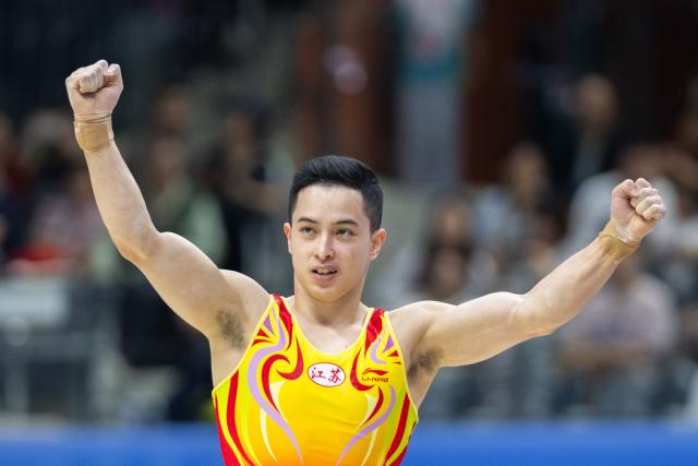 (251116) -- ZHAOQING, Nov. 16, 2025 (Xinhua) -- Yang Yanzhi of Jiangsu celebrates during the artistic gymnastics men's floor exercise final at China's 15th National Games in Zhaoqing, south China's Guangdong Province, Nov. 16, 2025. (Xinhua/Du Zixuan)