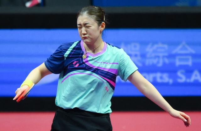 (251116) -- MACAO, Nov. 16, 2025 (Xinhua) -- Chen Meng reacts during the women's singles bronze medal match of table tennis between Zhu Yuling of Macao and Chen Meng of Shandong at China's 15th National Games in Macao, south China, Nov. 16, 2025. (Xinhua/Cheong Kam Ka)