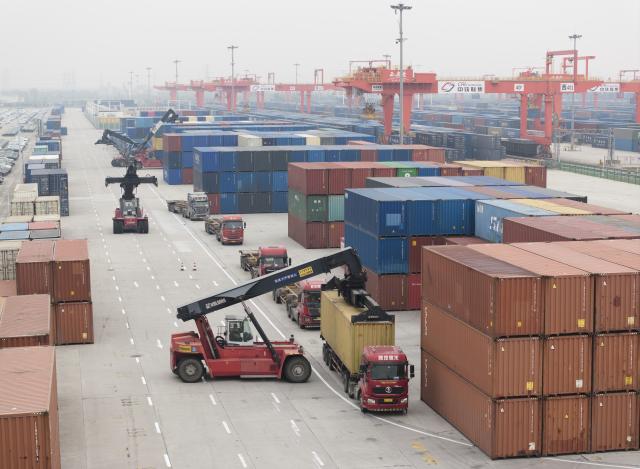 (251116) -- XI'AN, Nov. 16, 2025 (Xinhua) -- An aerial drone photo taken on Nov. 14, 2025 shows cranes working at the Xi'an International Port Station in Xi'an, northwest China's Shaanxi Province. Launched in 2013, the China-Europe freight train in Xi'an has ranked first nationwide in key aspects such as the number of trains, freight volume and laden-container ratio for many years. 
  Today, the Xi'an International Port Station operates 59 railway routes, with a designed annual container throughput of 5.4 million 20-foot equivalent units (TEUs). Projects such as the Kazakhstan-Xi'an port have been completed and put into operation, facilitating trade and transportation with Europe and Asia, accelerating the city's transformation into a modern international trade and logistics hub. (Xinhua/Shao Rui)