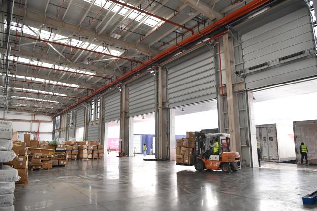 (251116) -- XI'AN, Nov. 16, 2025 (Xinhua) -- Workers operate at the Kazakhstan-Xi'an port of the Xi'an International Port Station in Xi'an, northwest China's Shaanxi Province, Nov. 14, 2025. Launched in 2013, the China-Europe freight train in Xi'an has ranked first nationwide in key aspects such as the number of trains, freight volume and laden-container ratio for many years. 
  Today, the Xi'an International Port Station operates 59 railway routes, with a designed annual container throughput of 5.4 million 20-foot equivalent units (TEUs). Projects such as the Kazakhstan-Xi'an port have been completed and put into operation, facilitating trade and transportation with Europe and Asia, accelerating the city's transformation into a modern international trade and logistics hub. (Xinhua/Shao Rui)