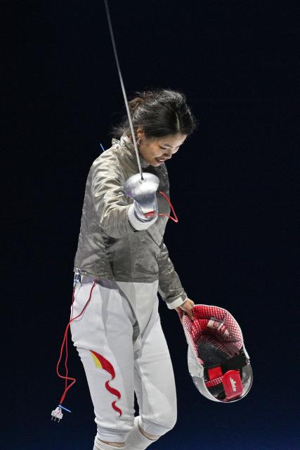 (251116) -- HONG KONG, Nov. 16, 2025 (Xinhua) -- Yang Hengyu of Jiangsu reacts after defeating Fu Ying of Jiangsu during the women's sabre individual final of fencing at China's 15th National Games in Hong Kong, south China, Nov. 16, 2025. (Xinhua/Chen Duo)