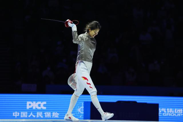 (251116) -- HONG KONG, Nov. 16, 2025 (Xinhua) -- Yang Hengyu of Jiangsu reacts after defeating Fu Ying of Jiangsu during the women's sabre individual final of fencing at China's 15th National Games in Hong Kong, south China, Nov. 16, 2025. (Xinhua/Zhu Wei)