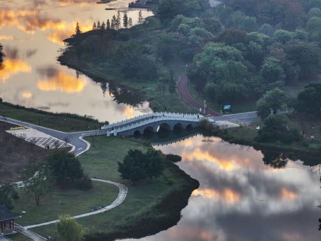 (251116) -- BEIJING, Nov. 16, 2025 (Xinhua) -- An aerial drone photo taken on Nov. 16, 2025 shows the view of a lake in Hezhou City, south China's Guangxi Zhuang Autonomous Region. (Photo by Yu Xiangquan/Xinhua)