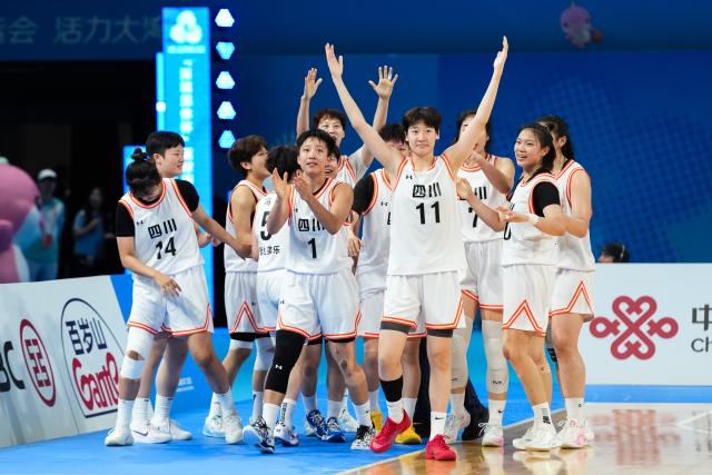(251116) -- SHENZHEN, Nov. 16, 2025 (Xinhua) -- Athletes of team Sichuan celebrate after winning the U22 women's final match of basketball between Sichuan and Zhejiang at China's 15th National Games in Shenzhen, south China's Guangdong Province, Nov. 16, 2025. (Xinhua/Chen Sihan)