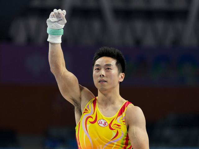 (251116) -- ZHAOQING, Nov. 16, 2025 (Xinhua) -- You Hao of Jiangsu competes during the artistic gymnastics men's rings final at China's 15th National Games in Zhaoqing, south China's Guangdong Province, Nov. 16, 2025. (Xinhua/Xu Bingjie)