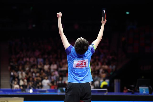 (251116) -- MACAO, Nov. 16, 2025 (Xinhua) -- Wang Manyu celebrates winning the women's singles final match of table tennis between Sun Yingsha of Hebei and Wang Manyu of Heilongjiang at China's 15th National Games in Macao, south China, Nov. 16, 2025. (Xinhua/Liang Xu)