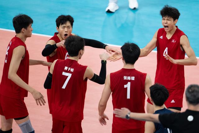 (251116) -- GUANGZHOU, Nov. 16, 2025 (Xinhua) -- Players of Zhejiang celebrate during the volleyball men's U18 final between Jiangsu and Zhejiang at China's 15th National Games in Guangzhou, south China's Guangdong Province, Nov. 16, 2025. (Xinhua/Xiao Yijiu)