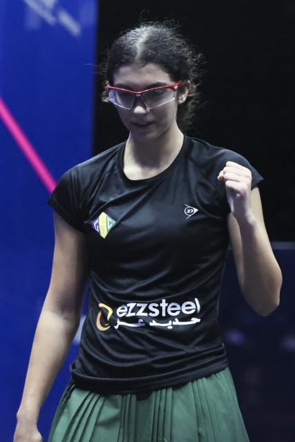 (251116) -- SHANGHAI, Nov. 16, 2025 (Xinhua) -- Amina Orfi celebrates after the women's singles final match between Watanabe Satomi of Japan and Amina Orfi of Egypt at the China Open squash tournament in Shanghai, east China, Nov. 16, 2025. (Xinhua/Wang Xiang)