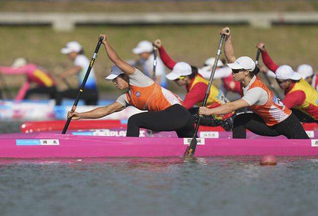 (251117) -- GUANGZHOU, Nov. 17, 2025 (Xinhua) -- Teng Anshuo (front L)/Jiang Xina (front R) of Hubei compete during the women's canoe double 500m final A of canoe sprint at China's 15th National Games in Guangzhou, south China's Guangdong Province, Nov. 17, 2025. (Xinhua/Jigme Dorji)