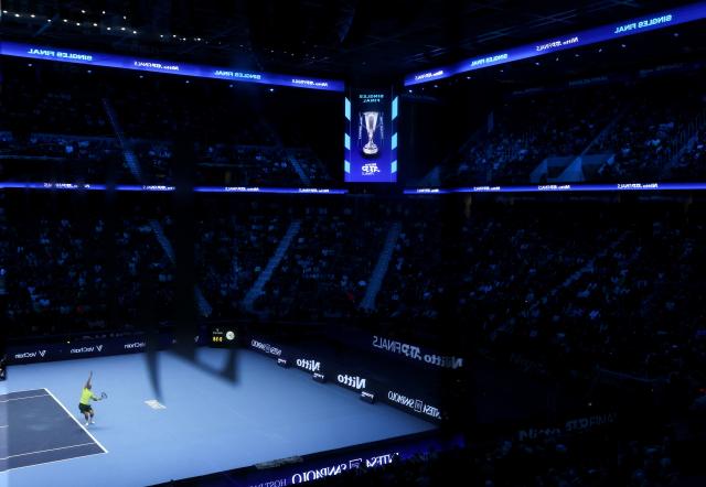 (251117) -- TURIN, Nov. 17, 2025 (Xinhua) -- Carlos Alcaraz serves during the men's singles final match between Jannik Sinner of Italy and Carlos Alcaraz of Spain at the ATP Finals tennis tournament in Turin, Italy, on Nov. 16, 2025. (Xinhua/Li Jing)