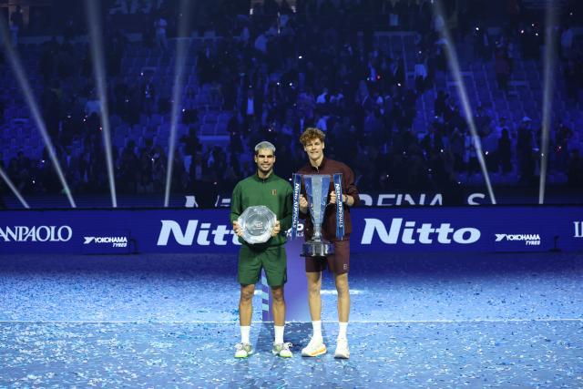 (251117) -- TURIN, Nov. 17, 2025 (Xinhua) -- Jannik Sinner (R) and Carlos Alcaraz pose for a photo after the men's singles final match between Jannik Sinner of Italy and Carlos Alcaraz of Spain at the ATP Finals tennis tournament in Turin, Italy, on Nov. 16, 2025. (Xinhua/Li Jing)