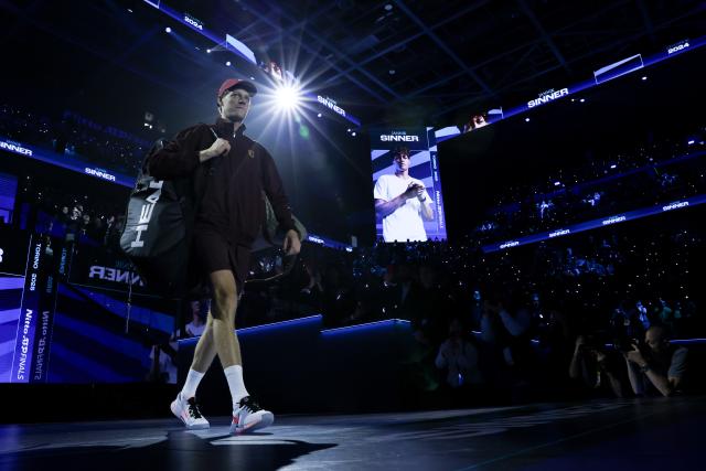 (251117) -- TURIN, Nov. 17, 2025 (Xinhua) -- Jannik Sinner walks into the court before the men's singles final match between Jannik Sinner of Italy and Carlos Alcaraz of Spain at the ATP Finals tennis tournament in Turin, Italy, on Nov. 16, 2025. (Xinhua/Li Jing)