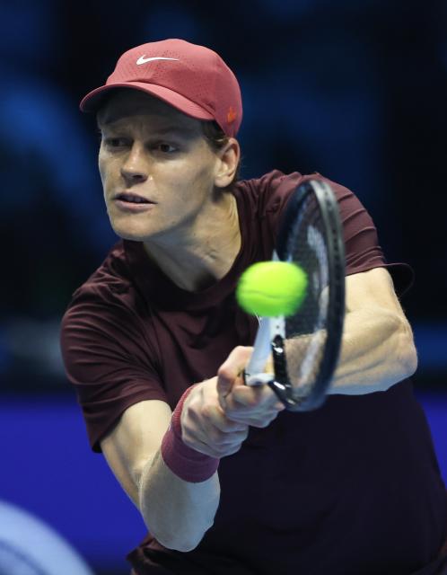 (251117) -- TURIN, Nov. 17, 2025 (Xinhua) -- Jannik Sinner returns a shot during the men's singles final match between Jannik Sinner of Italy and Carlos Alcaraz of Spain at the ATP Finals tennis tournament in Turin, Italy, on Nov. 16, 2025. (Xinhua/Li Jing)