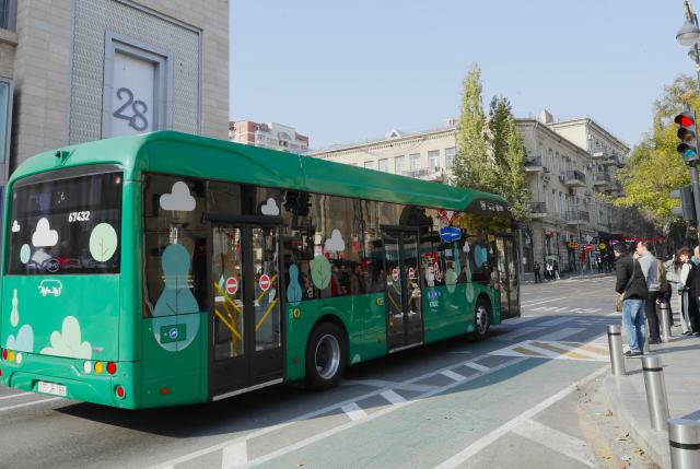 (251117) -- BAKU, Nov. 17, 2025 (Xinhua) -- A new energy bus of BYD brand is pictured on a street of Baku, Azerbaijan, on Nov. 16, 2025. In the eyes of locals in Baku, Chinese cars are cost-effective, energy-saving, and environmentally friendly, so more and more people are choosing to buy Chinese cars. (Xinhua/Chen Junfeng)