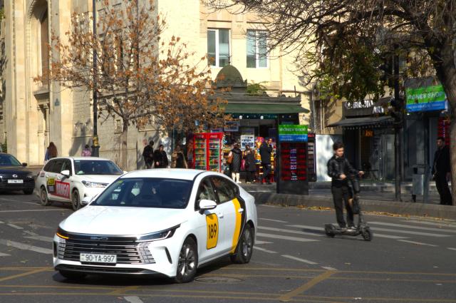 (251117) -- BAKU, Nov. 17, 2025 (Xinhua) -- A car of BYD brand is seen on a street of Baku, Azerbaijan, on Nov. 16, 2025. In the eyes of locals in Baku, Chinese cars are cost-effective, energy-saving, and environmentally friendly, so more and more people are choosing to buy Chinese cars. (Xinhua/Chen Junfeng)