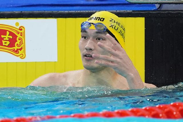 (251117) -- SHENZHEN, Nov. 17, 2025 (Xinhua) -- Xu Jiayu of Zhejiang reacts after the men's 50m backstroke final of swimming at China's 15th National Games in Shenzhen, south China's Guangdong Province, Nov. 17, 2025. (Xinhua/Du Yu)