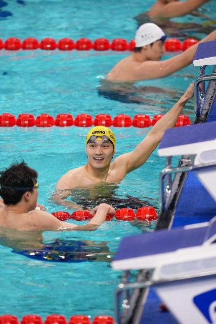 (251117) -- SHENZHEN, Nov. 17, 2025 (Xinhua) -- Xu Jiayu of Zhejiang reacts after the men's 50m backstroke final of swimming at China's 15th National Games in Shenzhen, south China's Guangdong Province, Nov. 17, 2025. (Xinhua/Ding Zengnida)
