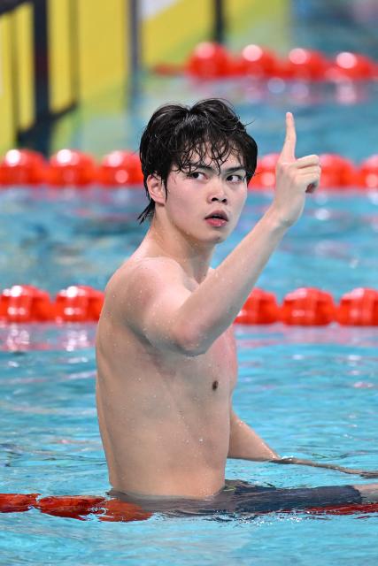 (251117) -- SHENZHEN, Nov. 17, 2025 (Xinhua) -- Xu Haibo of Hubei celebrates after the men's 4X100m medley relay final of swimming at China's 15th National Games in Shenzhen, south China's Guangdong Province, Nov. 17, 2025. (Xinhua/Chen Yichen)