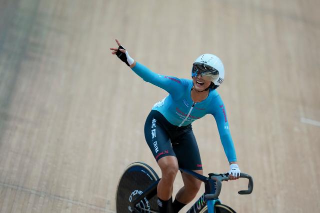 (251117) -- HONG KONG, Nov. 17, 2025 (Xinhua) -- Lee Sze Wing of Hong Kong celebrates after winning the cycling track women's omnium at China's 15th National Games in Hong Kong, south China, Nov. 17, 2025. (Xinhua/Wu Lu)