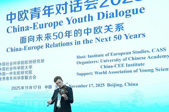 (251117) -- BEIJING, Nov. 17, 2025 (Xinhua) -- A European representative plays the violin during the China-Europe Youth Dialogue 2025 in Beijing, capital of China, Nov. 17, 2025. The China-Europe Youth Dialogue 2025 was held here on Monday. Hosted by the Institute of European Studies of the Chinese Academy of Social Sciences, the conference has brought together 61 Gen-Z representatives from 30 European countries and about 60 students and young scholars from China -- who are exploring the theme of "China-Europe Relations in the Next 50 Years." (Xinhua)