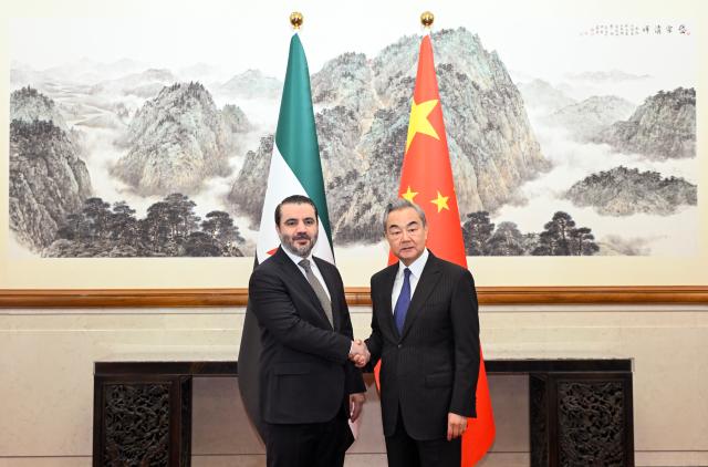(251117) -- BEIJING, Nov. 17, 2025 (Xinhua) -- Chinese Foreign Minister Wang Yi, also a member of the Political Bureau of the Communist Party of China Central Committee, holds talks with Syrian Minister of Foreign Affairs Asaad Hassan al-Shibani in Beijing, capital of China, Nov. 17, 2025. (Xinhua/Jin Liangkuai)