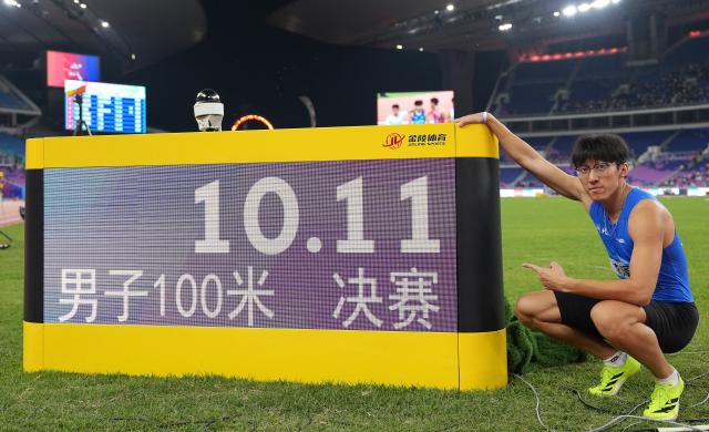 (251117) -- GUANGZHOU, Nov. 17, 2025 (Xinhua) -- Li Zeyang of Hubei reacts after the men's 100m final of athletics at China's 15th National Games in Guangzhou, south China's Guangdong Province, Nov. 17, 2025. (Xinhua/Jiang Han)