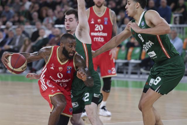 (251118) -- LJUBLJANA, Nov. 18, 2025 (Xinhua) -- Codi Miller Mclntyre (front L) of Cedevita Olimpija Ljubljanat competes during the ABA League basketball match between Cedevita Olimpija Ljubljana and Crvena Zvezda Meridianbet in Ljubljana, Slovenia, Nov. 17, 2025. (Photo by Zeljko Stevanic/Xinhua)