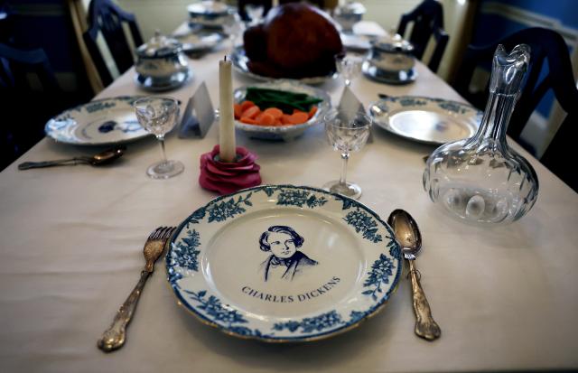 (251118) -- LONDON, Nov. 18, 2025 (Xinhua) -- A plate with a portrait of Charles Dickens is seen in the Charles Dickens Museum in London, Britain, Nov. 17, 2025. The museum is situated at 48 Doughty Street, Dickens's London home from 1837-1839. While living in Doughty Street, Charles Dickens, a famous British novelist, journalist and editor, finished writing "The Pickwick Papers," wrote "Nicholas Nickleby" and most famously of all, "Oliver Twist." (Xinhua/Li Ying)