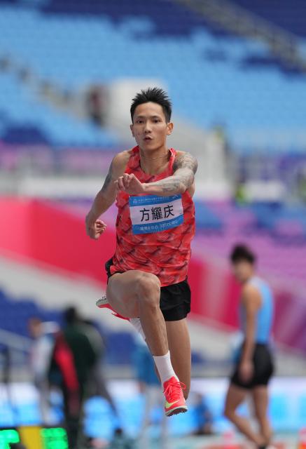 (251118) -- GUANGZHOU, Nov. 18, 2025 (Xinhua) -- Fang Yaoqing of Shaanxi competes during the men's triple jump qualification of athletics at China's 15th National Games in Guangzhou, south China's Guangdong Province, Nov. 18, 2025. (Xinhua/Li Yibo)