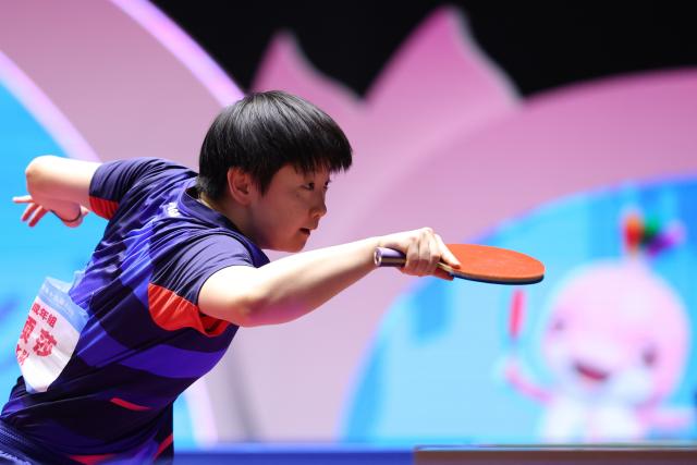 (251118) -- MACAO, Nov. 18, 2025 (Xinhua) -- Sun Yingsha of Hebei hits a return in the match against Liu Fei of Liaoning during the women's team quarterfinal match of table tennis between Hebei and Liaoning at China's 15th National Games in Macao, south China, Nov. 18, 2025. (Xinhua/Liang Xu)