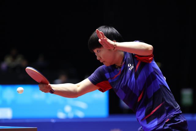 (251118) -- MACAO, Nov. 18, 2025 (Xinhua) -- Sun Yingsha of Hebei hits a return in the match against Chen Xingtong of Liaoning during the women's team quarterfinal match of table tennis between Hebei and Liaoning at China's 15th National Games in Macao, south China, Nov. 18, 2025. (Xinhua/Liang Xu)