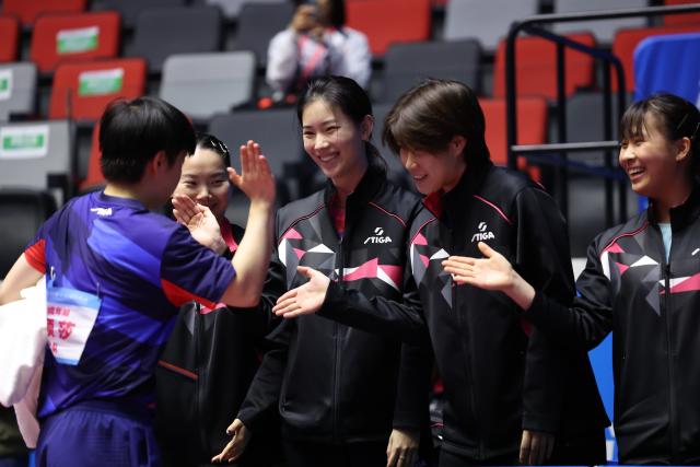 (251118) -- MACAO, Nov. 18, 2025 (Xinhua) -- Sun Yingsha (1st L) of Hebei celebrates with her teammates after defeating Chen Xingtong of Liaoning during the women's team quarterfinal match of table tennis between Hebei and Liaoning at China's 15th National Games in Macao, south China, Nov. 18, 2025. (Xinhua/Liang Xu)