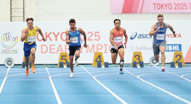 (251118) -- TOKYO, Nov. 18, 2025 (Xinhua) -- (From L to R) Simon Sharapo of Sweden, Dmytro Vyshynskyi of Ukraine, Sasaki Takuma of Japan and Tanel Visnap of Estonia compete during the men's 100m final of athletics at the 25th Summer Deaflympics Tokyo 2025 in Tokyo, Japan, Nov. 18, 2025. (Xinhua/Jia Haocheng)