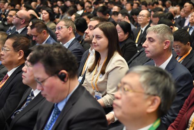 (251118) -- XI'AN, Nov. 18, 2025 (Xinhua) -- Participants attend the opening ceremony of the second China Railway Express Cooperation Forum in Xi'an, northwest China's Shaanxi Province, Nov. 18, 2025. Themed "Connecting Asia and Europe for a Shared Future," the forum opened here on Tuesday. (Xinhua/Shao Rui)