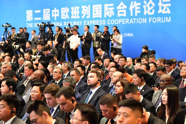 (251118) -- XI'AN, Nov. 18, 2025 (Xinhua) -- Participants attend the opening ceremony of the second China Railway Express Cooperation Forum in Xi'an, northwest China's Shaanxi Province, Nov. 18, 2025. Themed "Connecting Asia and Europe for a Shared Future," the forum opened here on Tuesday. (Xinhua/Shao Rui)