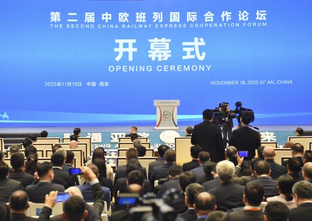 (251118) -- XI'AN, Nov. 18, 2025 (Xinhua) -- This photo taken on Nov. 18, 2025 shows the opening ceremony of the second China Railway Express Cooperation Forum in Xi'an, northwest China's Shaanxi Province. Themed "Connecting Asia and Europe for a Shared Future," the forum opened here on Tuesday. (Xinhua/Shao Rui)