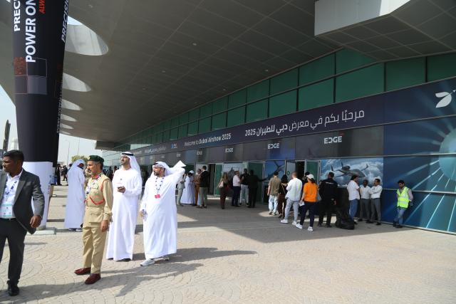 (251118) -- DUBAI, Nov. 18, 2025 (Xinhua) -- People visit the 19th edition of the Dubai Airshow in Dubai, the United Arab Emirates (UAE) on Nov. 17, 2025. The 19th edition of the Dubai Airshow opened Monday at Dubai World Central, featuring the Middle East debut of two of China's homegrown C919 aircraft.
   Organizers said the five-day event, held under the theme "The Future is Here," has drawn more than 1,500 exhibitors, including 440 first-time participants. 
   The Commercial Aircraft Corporation of China (COMAC), maker of the C919, is showcasing one C919 and one C909 aircraft, while China Southern Airlines has brought another C919. The appearance of the C919 marks its first showing in the Middle East, and COMAC performed a flight demonstration of the China-made passenger plane at the venue. (Xinhua/Wen Xinnian)