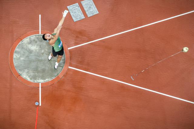 (251118) -- GUANGZHOU, Nov. 18, 2025 (Xinhua) -- Li Zixu of Jiangsu competes during the men's hammer throw final of athletics at China's 15th National Games in Guangzhou, south China's Guangdong Province, Nov. 18, 2025. (Xinhua/Jiang Han)