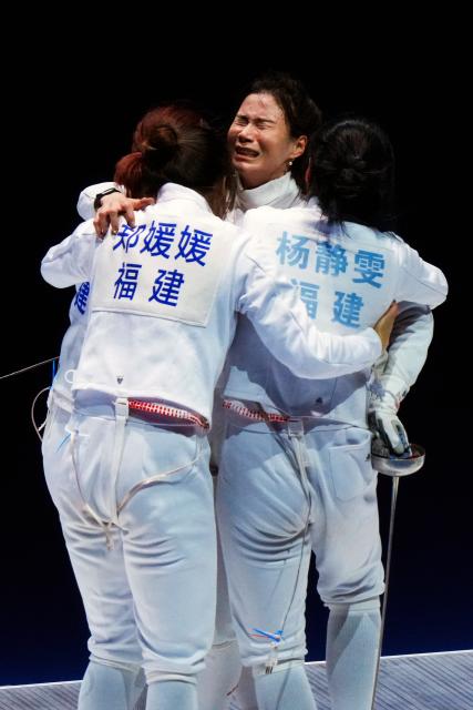 (251118) -- HONG KONG, Nov. 18, 2025 (Xinhua) -- Athletes of team Fujian celebrate after winning the women's team epee final of fencing between Fujian and Anhui at China's 15th National Games in Hong Kong, south China, Nov. 18, 2025. (Xinhua/Zhu Wei)