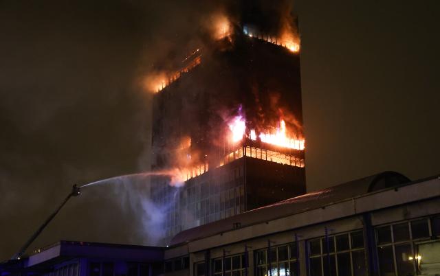(251118) -- ZAGREB, Nov. 18, 2025 (Xinhua) -- Firefighters work to extinguish the fire of the Vjesnik skyscraper in Zagreb, Croatia, Nov. 18, 2025 . One of the tallest buildings in Croatia caught fire shortly before midnight on Monday and continues to burn Tuesday morning, local media reported. (Matija Habljak/PIXSELL via Xinhua)