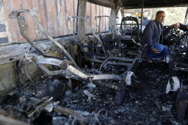 (251118) -- BETHLEHEM, Nov. 18, 2025 (Xinhua) -- Palestinians inspect a burned vehicle in Al-Jaba village, West Bank city of Bethlehem, on Nov. 18, 2025. According to the official WAFA news agency, Israeli settlers on Monday evening torched several homes and vehicles in Al-Jaba village. (Photo by Mamoun Wazwaz/Xinhua)