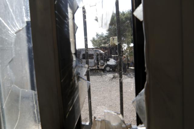 (251118) -- BETHLEHEM, Nov. 18, 2025 (Xinhua) -- A burned vehicle is seen through a broken window in Al-Jaba village, West Bank city of Bethlehem, on Nov. 18, 2025. According to the official WAFA news agency, Israeli settlers on Monday evening torched several homes and vehicles in Al-Jaba village. (Photo by Mamoun Wazwaz/Xinhua)
