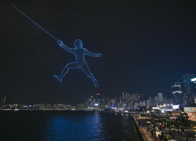 (251119) -- BEIJING, Nov. 19, 2025 (Xinhua) -- A drone light show celebrating the spirit of sports is staged in Hong Kong, south China, Nov. 18, 2025. (Xinhua/Chen Duo)