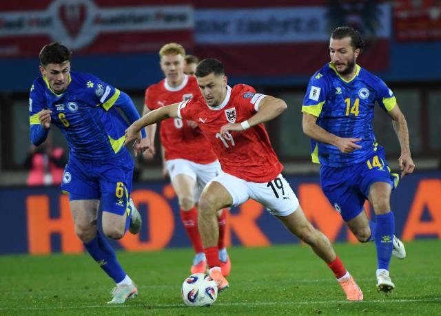 (251119) -- VIENNA, Nov. 19, 2025 (Xinhua) -- Christoph Baumgartner (C) of Austria competes during the 2026 World Cup European Qualifiers match between Austria VS Bosnia and Herzegovina in Vienna, Austria, Nov. 18, 2025. (Xinhua/He Canling)
