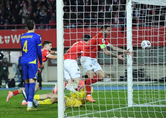 (251119) -- VIENNA, Nov. 19, 2025 (Xinhua) -- Players of Austria react for a goal during the 2026 World Cup European Qualifiers match between Austria VS Bosnia and Herzegovina in Vienna, Austria, Nov. 18, 2025. (Xinhua/He Canling)