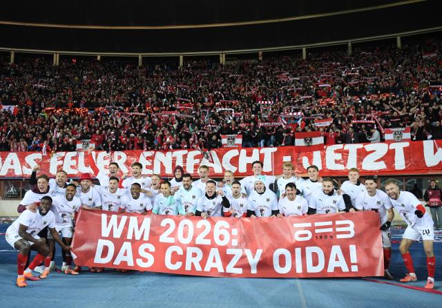 (251119) -- VIENNA, Nov. 19, 2025 (Xinhua) -- Players of Austria pose for photos with supporters after the 2026 World Cup European Qualifiers match between Austria VS Bosnia and Herzegovina in Vienna, Austria, Nov. 18, 2025. (Xinhua/He Canling)