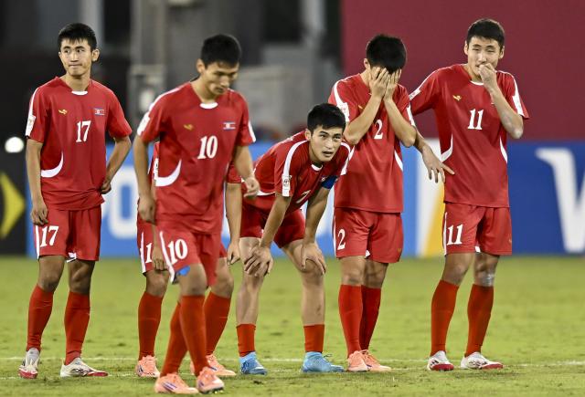 (251119) -- DOHA, Nov. 19, 2025 (Xinhua) -- Players of DPRK react during the round of 16 football match between the Democratic People's Republic of Korea (DPRK) and Japan at FIFA U17 World cup Qatar 2025 in Doha, Qatar, on Nov. 18, 2025. (Photo by Nikku/Xinhua)