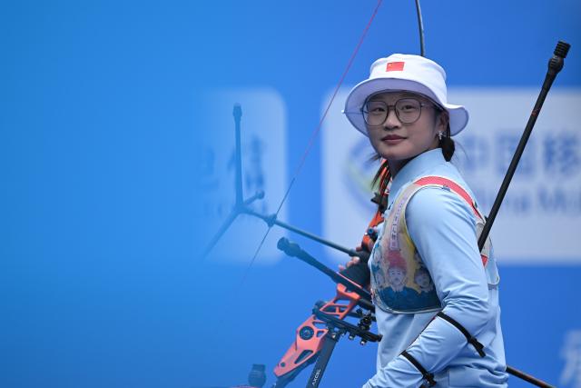 (251119) -- SHENZHEN, Nov. 19, 2025 (Xinhua) -- Liu Yanxiu of Shandong reacts after the women's recurve team final of archery at China's 15th National Games in Shenzhen, south China's Guangdong Province, Nov. 19, 2025. (Xinhua/Zhang Long)
