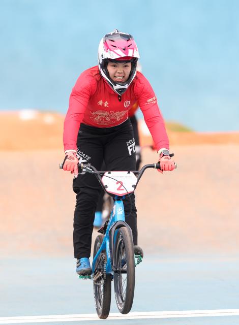 (251119) -- SHENZHEN, Nov. 19, 2025 (Xinhua) -- Liao Wanyi of Guangdong crosses the finish line during the women's final of cycling BMX racing at China's 15th National Games in Shenzhen, south China's Guangdong Province, Nov. 19, 2025. (Xinhua/Ding Ting)